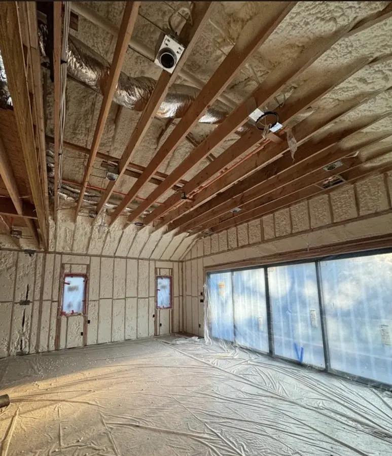 Interior walls and ceiling insulated with spray foam during new construction in Winter Haven